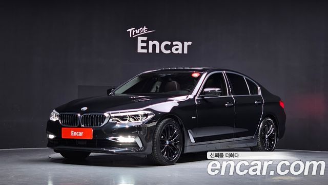 BMW 5-Series 2018 — photo 1