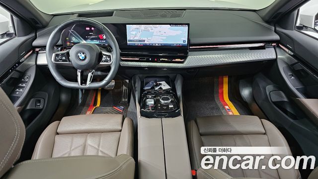 BMW 5-Series 2024 — photo 10