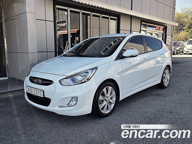 Hyundai Accent 2012 — photo 1