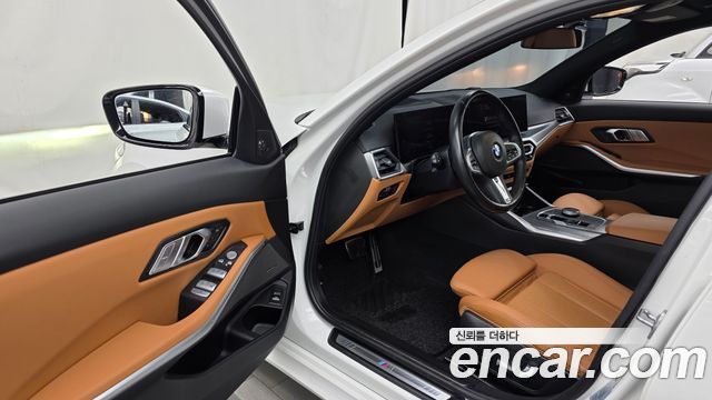 BMW 3-Series 2023 — photo 10