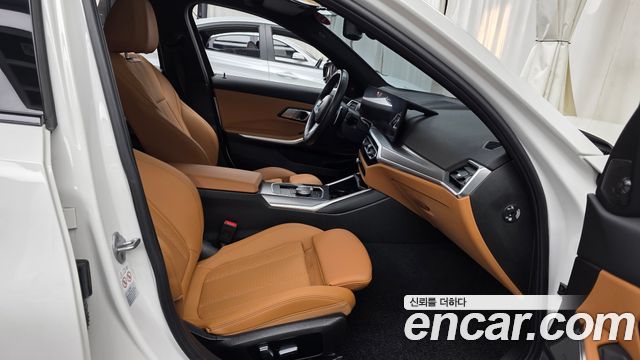 BMW 3-Series 2023 — photo 11