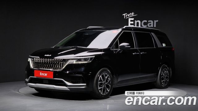 Kia Canival 2023 — photo 1