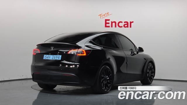 Tesla Model Y 2021 — photo 2