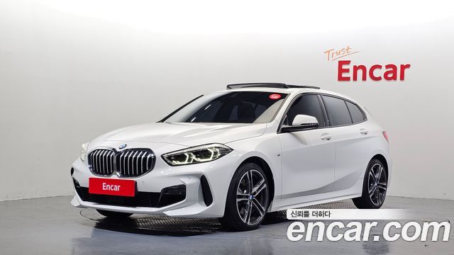 BMW 1-Series 2024 — photo 1