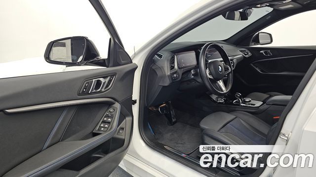 BMW 1-Series 2024 — photo 13