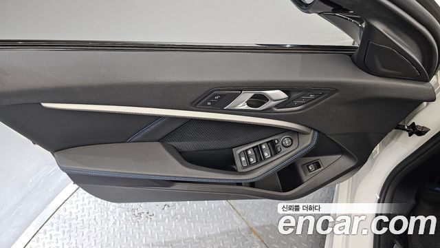 BMW 1-Series 2024 — photo 14