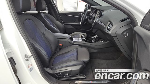BMW 1-Series 2024 — photo 16