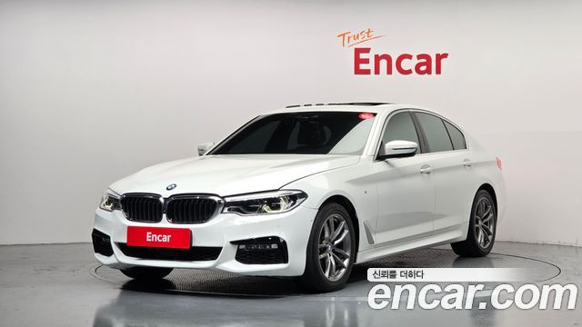 BMW 5-Series 2018 — photo 1