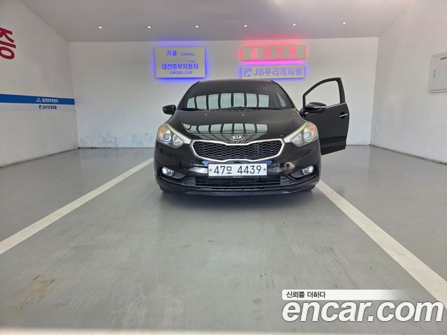 Kia K3 2015 — photo 1