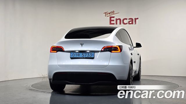 Tesla Model Y 2024 — photo 4