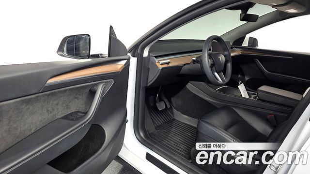 Tesla Model Y 2024 — photo 13