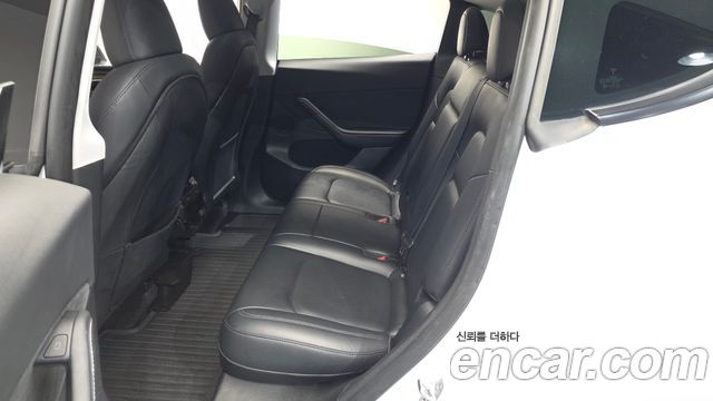 Tesla Model Y 2024 — photo 17