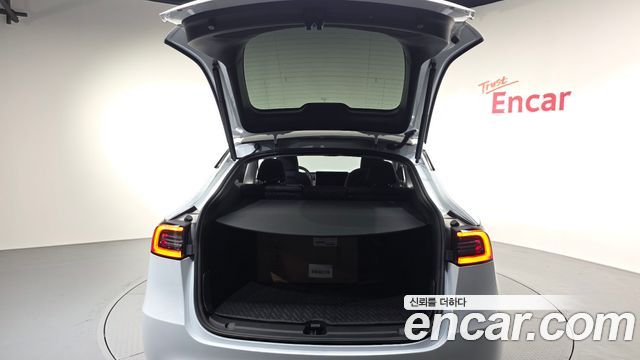 Tesla Model Y 2024 — photo 24