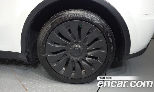 Tesla Model Y 2024 — photo 7
