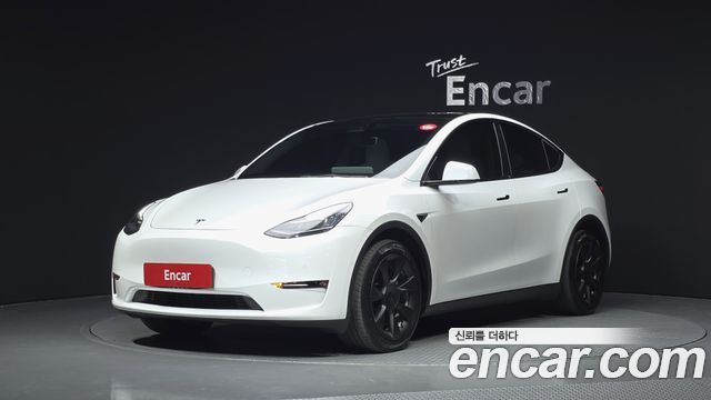 Tesla Model Y 2021 — photo 1