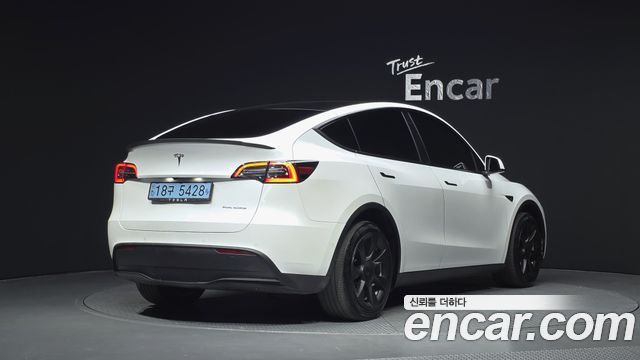 Tesla Model Y 2021 — photo 2