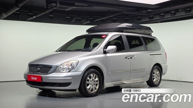 Kia Canival 2012 — photo 1