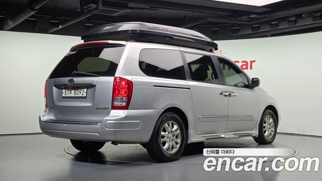 Kia Canival 2012 — photo 2