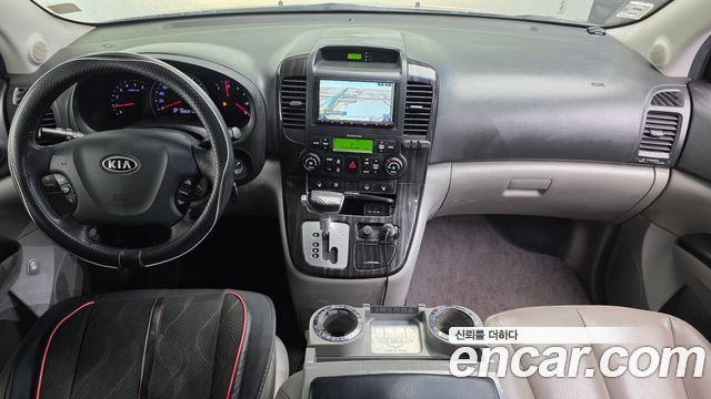 Kia Canival 2012 — photo 7