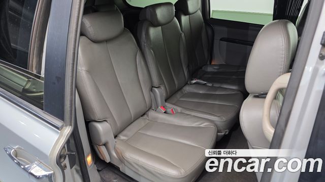 Kia Canival 2012 — photo 12