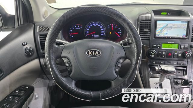 Kia Canival 2012 — photo 13