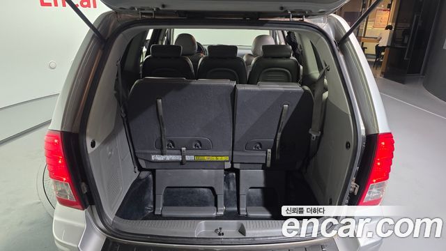 Kia Canival 2012 — photo 20