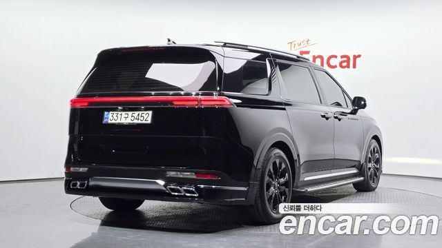 Kia Canival 2021 — photo 2