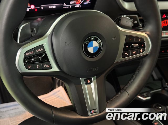 BMW 1-Series 2024 — photo 10