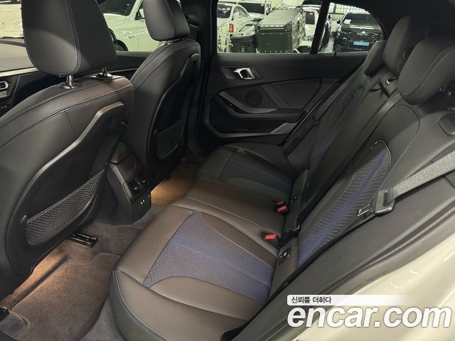 BMW 1-Series 2024 — photo 16