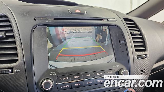 Kia K3 2015 — photo 21