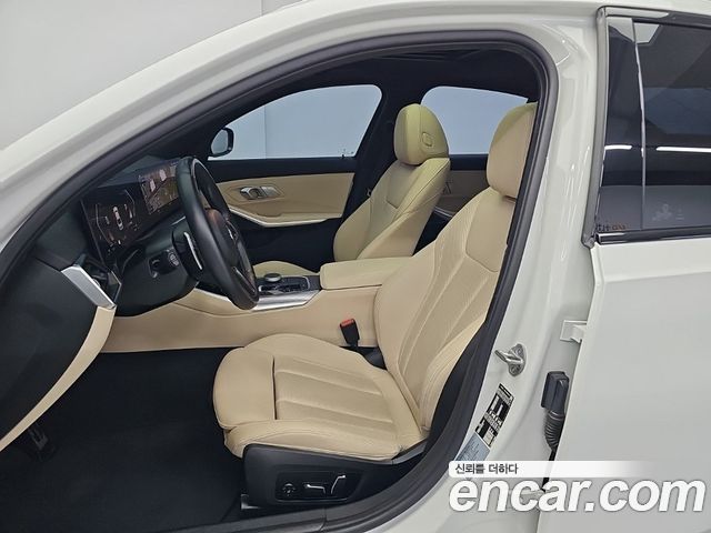 BMW 3-Series 2024 — photo 11