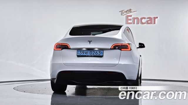 Tesla Model Y 2024 — photo 4