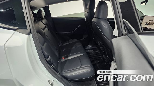 Tesla Model Y 2024 — photo 17
