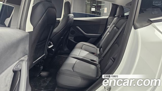 Tesla Model Y 2024 — photo 18