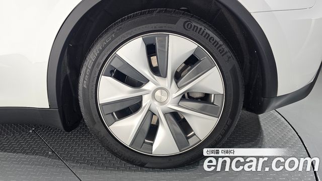 Tesla Model Y 2024 — photo 7