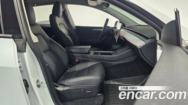 Tesla Model Y 2024 — photo 16