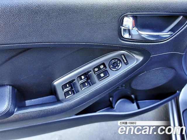 Kia K3 2013 — photo 14