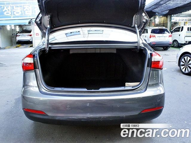 Kia K3 2013 — photo 18