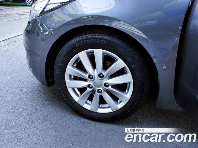 Kia K3 2013 — photo 20