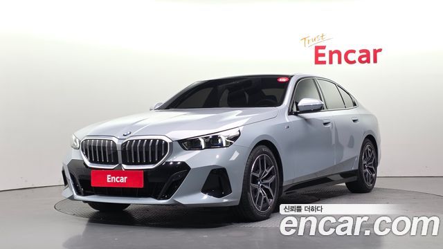 BMW 5-Series 2024 — photo 1
