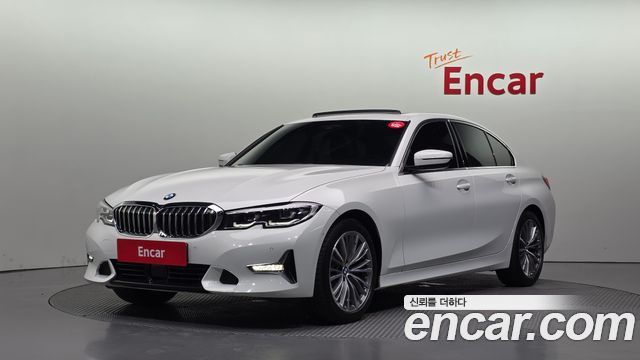 BMW 3-Series 2022 — photo 1