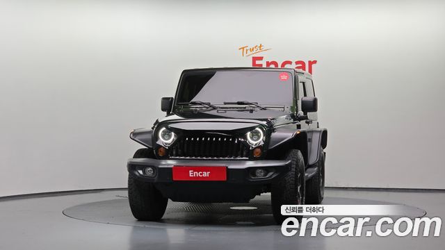 Jeep Wrangler 2010 — photo 3