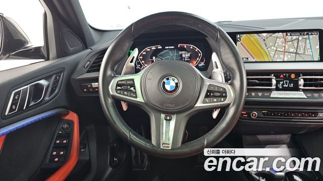 BMW 1-Series 2023 — photo 13