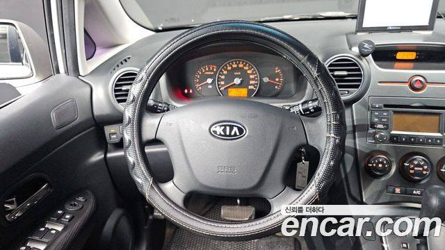 Kia Carens 2013 — photo 13