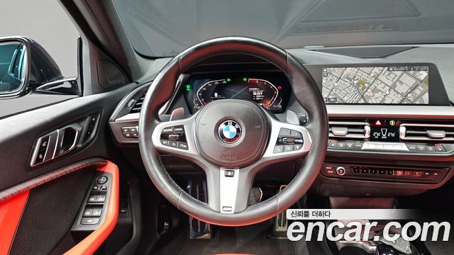 BMW 1-Series 2022 — photo 13