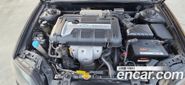 Hyundai Tuscani 2005 — photo 6