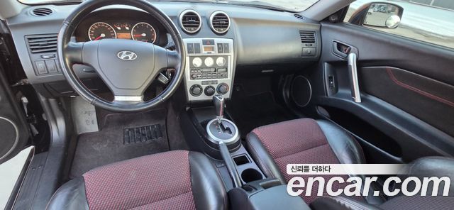 Hyundai Tuscani 2005 — photo 7