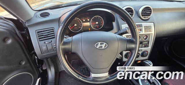 Hyundai Tuscani 2005 — photo 8