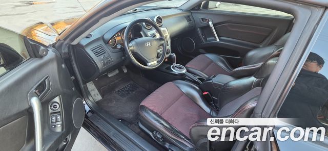 Hyundai Tuscani 2005 — photo 10