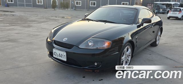 Hyundai Tuscani 2005 — photo 11